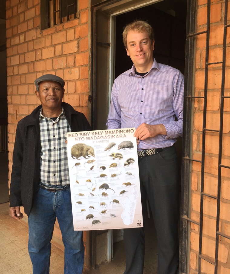 Handing over of tenrec posters to Félix Rakotondraparany, Universit&eacute; d'Antananarivo, in 2024. Copyright D. Kupitz